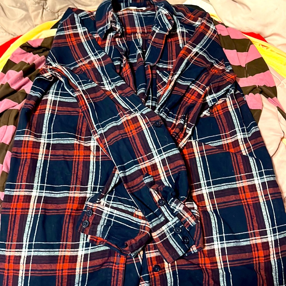 Long sleeve flannel shirt.